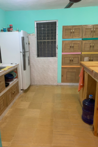 kitchen at casa samay hostel in cozumel