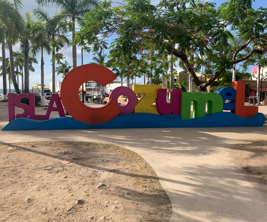 cozumel sign near the ferry dock